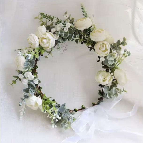 Blomsterkrans til hret med hvide blomster