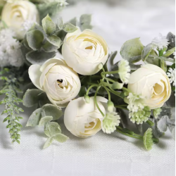 Blomsterkrans til hret med hvide blomster