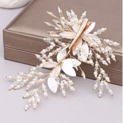 H�rclip med hvide perleblomster