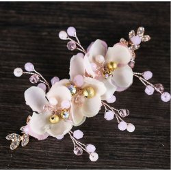 H�rclip med rosa stofblomster og perler