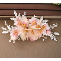 H�rkam med rosa stofblomster og krystaller