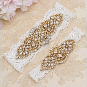 Strmpebnd-st hvidt med guldindfattede krystaller
